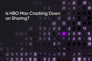 Is HBO Max Cracking Down on Sharing? What's Actually Changed in 2026 1 One apartment window glowing violet among dozens of identical windows, symbolising how HBO Max is cracking down on sharing by singling out individual households